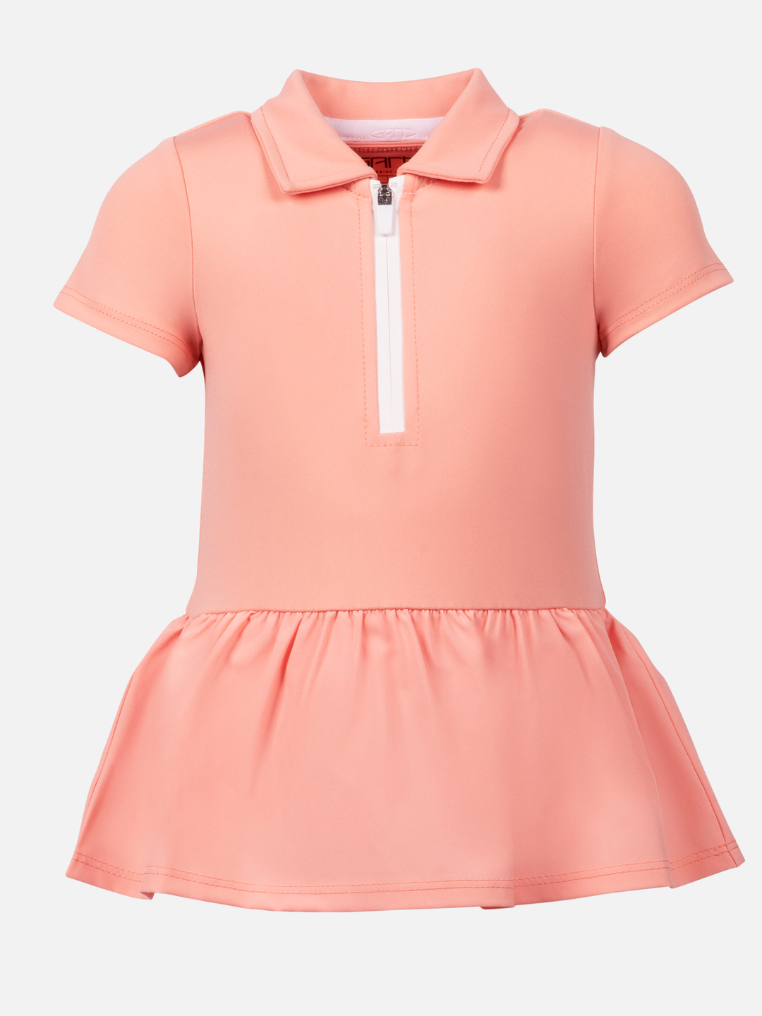 Peach-colored dress with a zipper on a light gray background