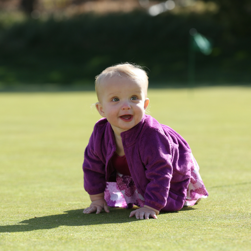 Lifestyle Image of Leslie - Infant Girls Rose Violet Full Zip Plush Jacket by Garb Infant Golf Course Apparel